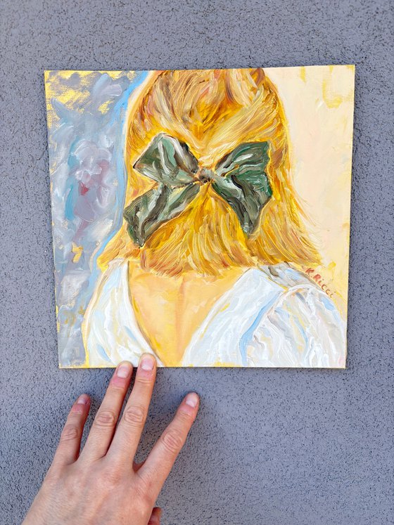 Back Portrait of a Blonde Girl