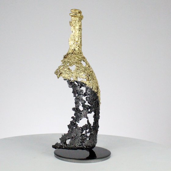 CLXXV bottle - Ruinart champagne bottle sculpture in gold steel