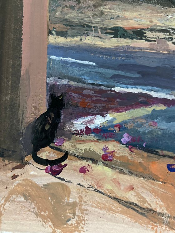 Cat by the garage