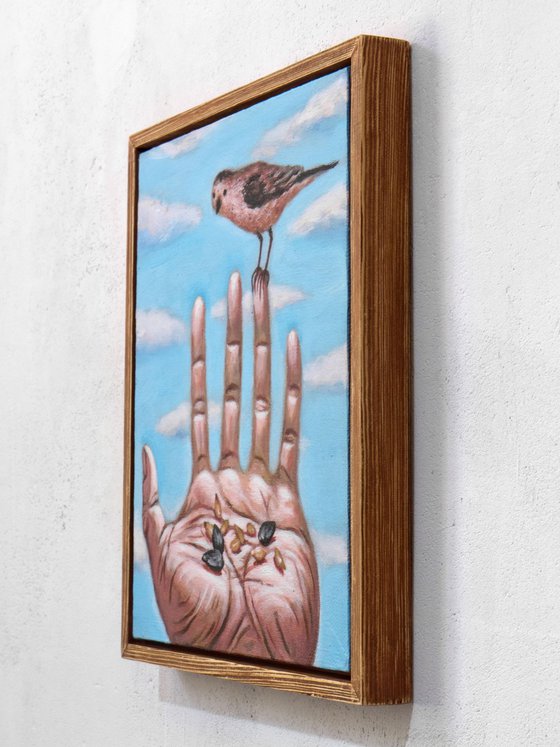 Hand with a bird