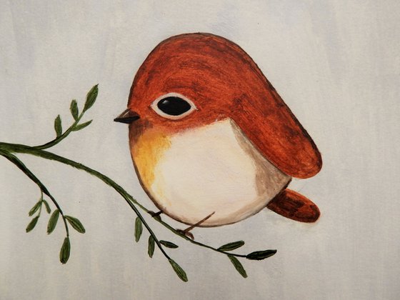 The small bird in burnt Sienna color