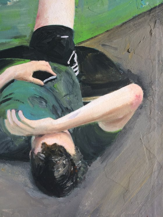 Young Man Relaxing By Canal