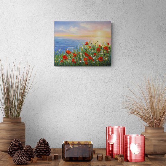 Sunset seascape and poppies