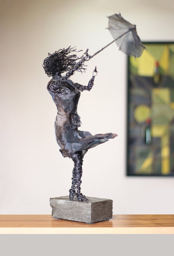 Playing with the wind (52x29x14cm 3kg iron, basalt)