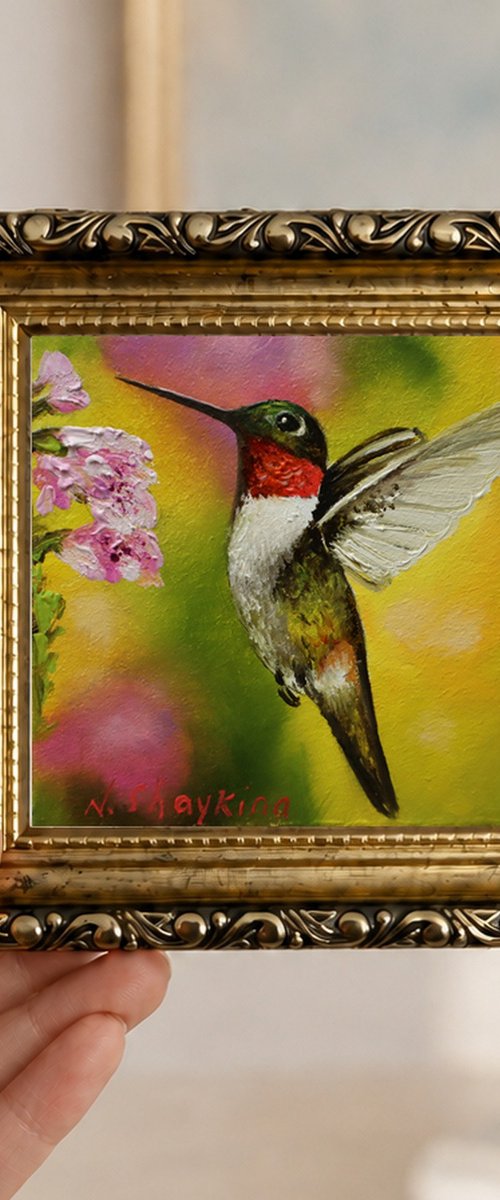 Ruby-Throated Hummingbird and Pink Blossoms by Natalia Shaykina