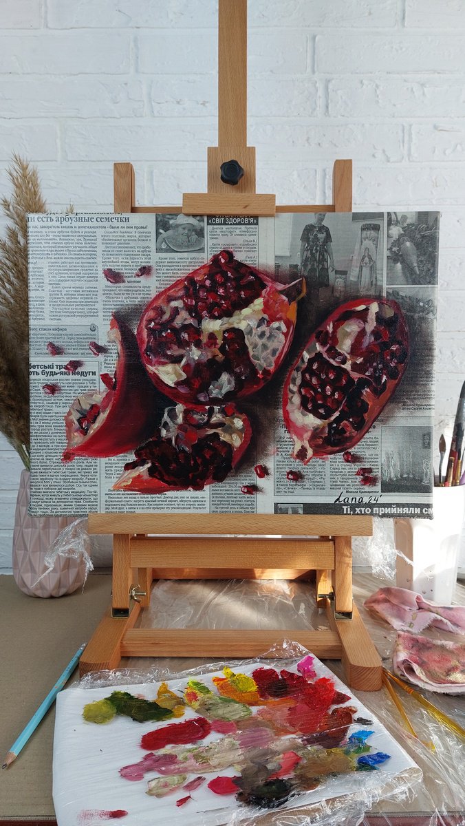 Pomegranate newspaper art by Svitlana Brazhnikova