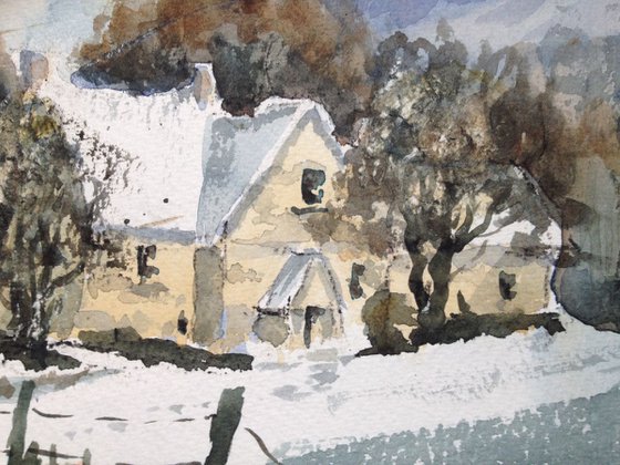Farm cottage in the snow