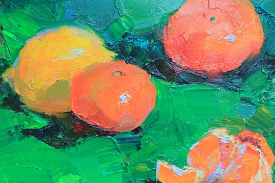 Tangerines on green