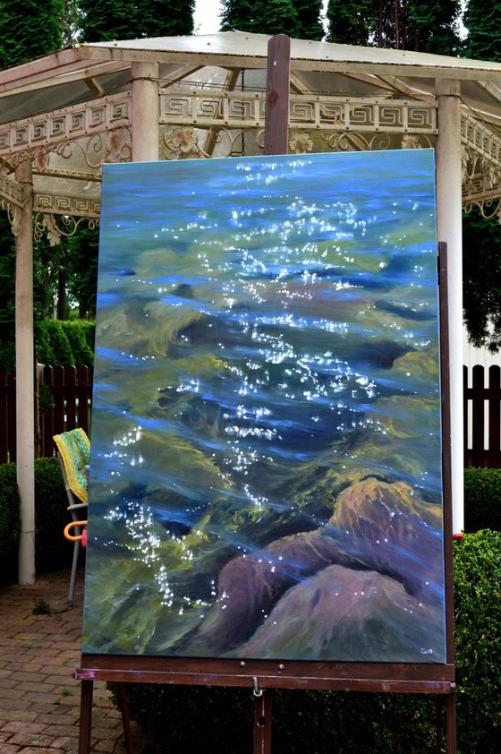 Music of the sea. Transparent water. Large