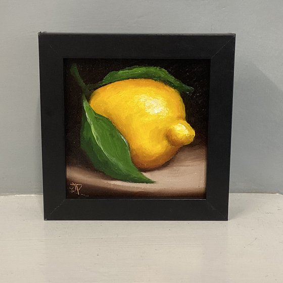 Little leafy lemon still life