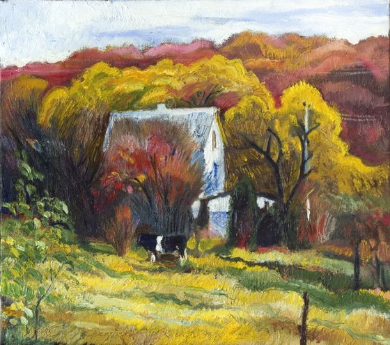 Autumn landscape with cow