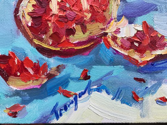pomegranate on blue