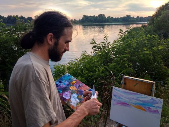 Sunset at the river. Pleinair painting