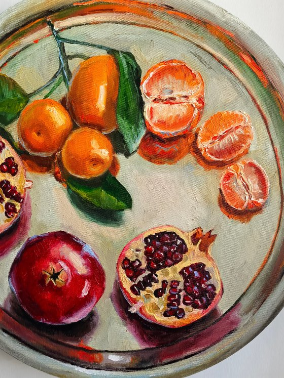 Pomegranates and tangerines