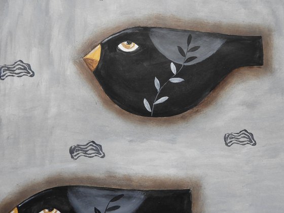 A couple of freaky black birds