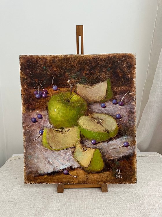 Green apples on dark