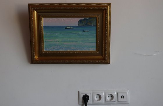 Sunset. Boats on the sea