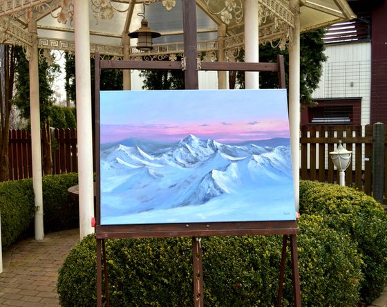 Morning light on snowy peaks