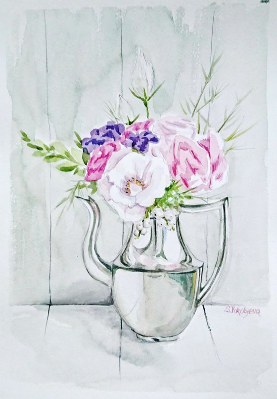 Flowers in a metallic jug