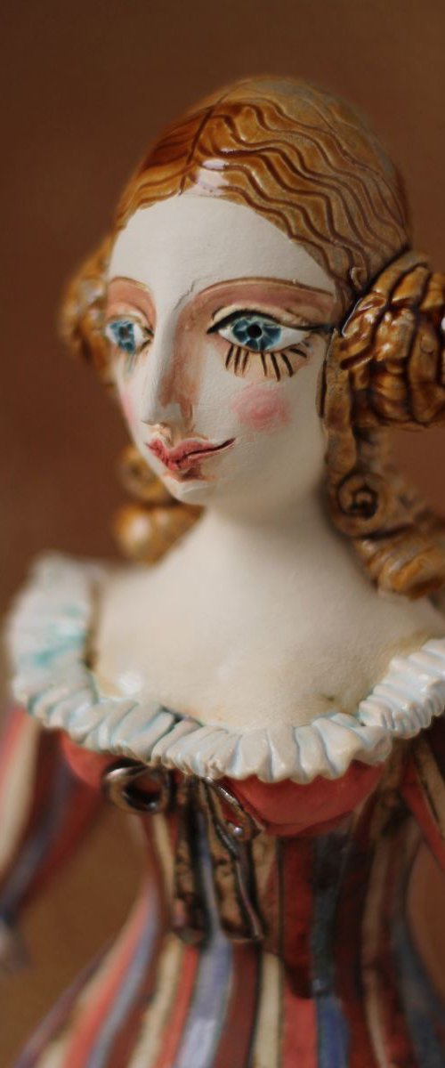 From the Naked clay series, Harlequine Girl. Wall sculpture by Elya Yalonetski by Elya Yalonetski
