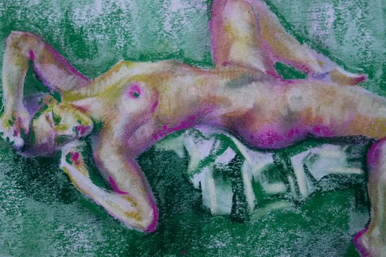 Nude woman on green background