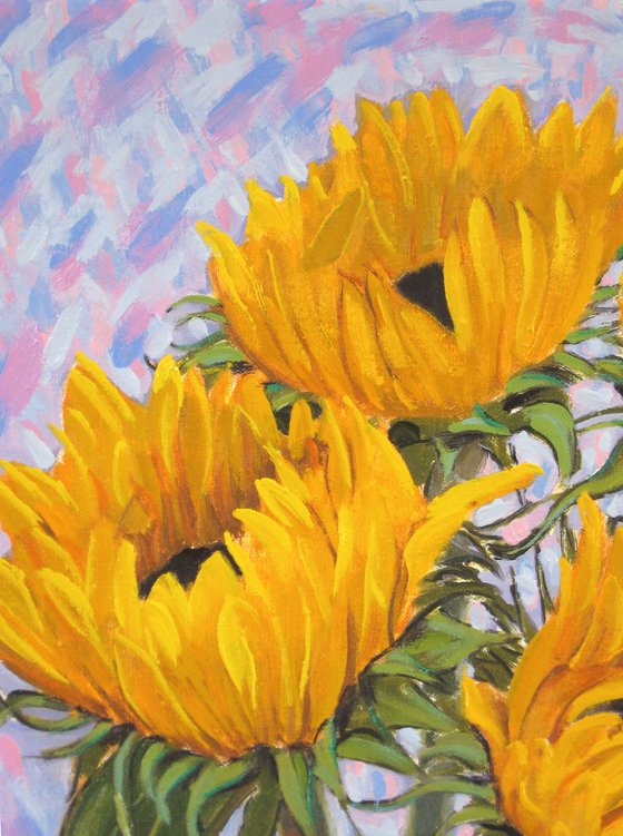 Four sunflowers in a vase