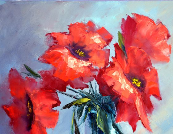 Red poppies on blue