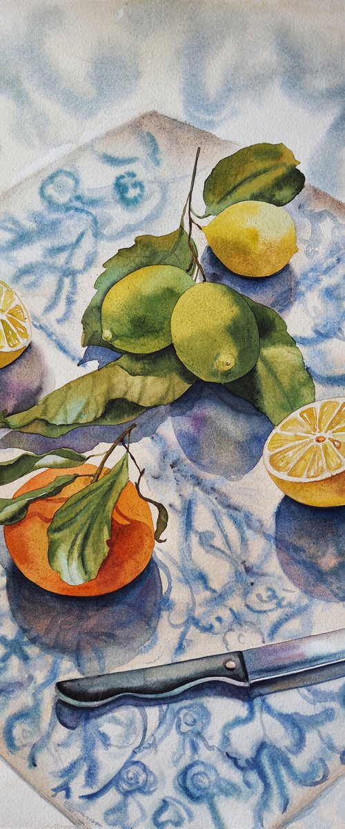 Lemons, orange and knife by Delnara El