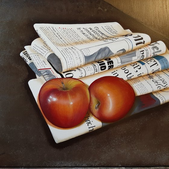 Newspaper with apples