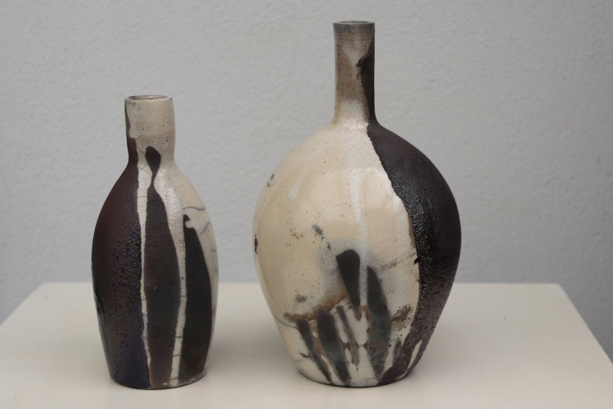 2 raku and black vessels by Koen Lybaert