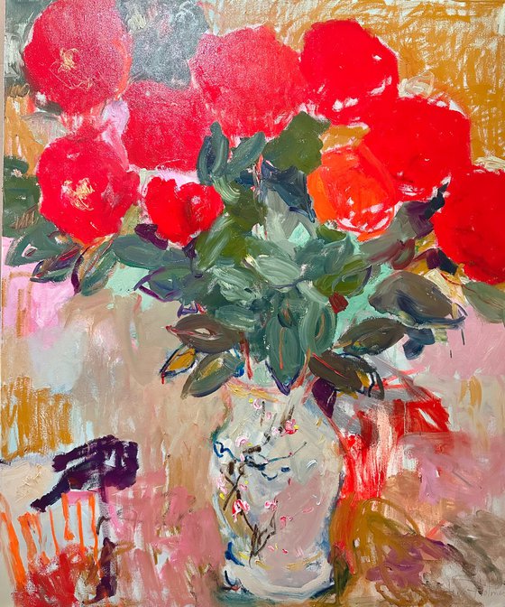 Red roses in a Japanese vase