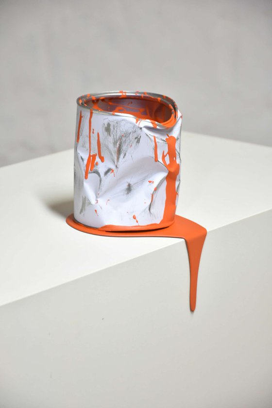 The old can of orange paint