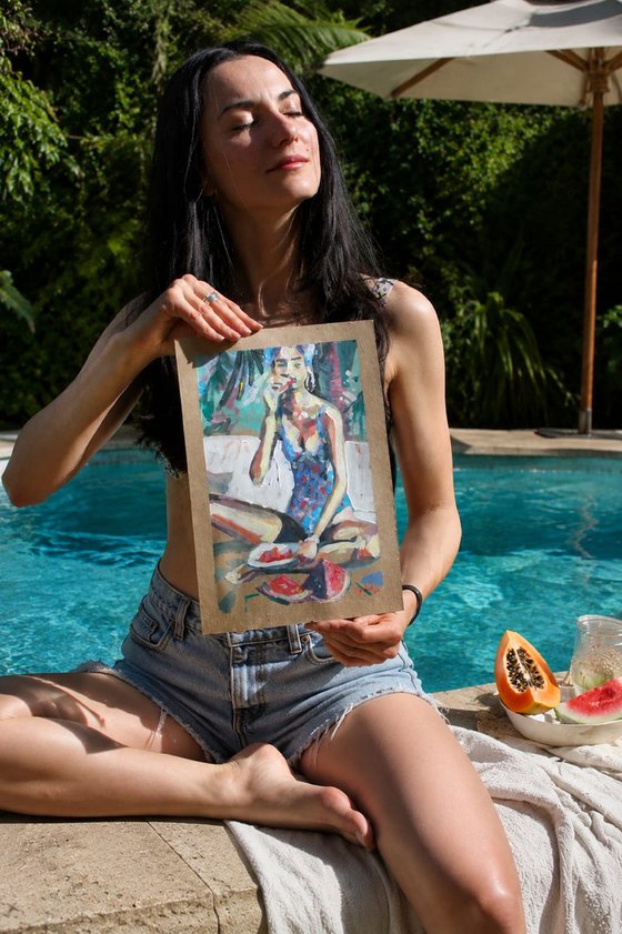 A girl in a blue swimsuit