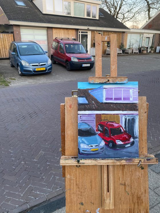 Cars parked near the house