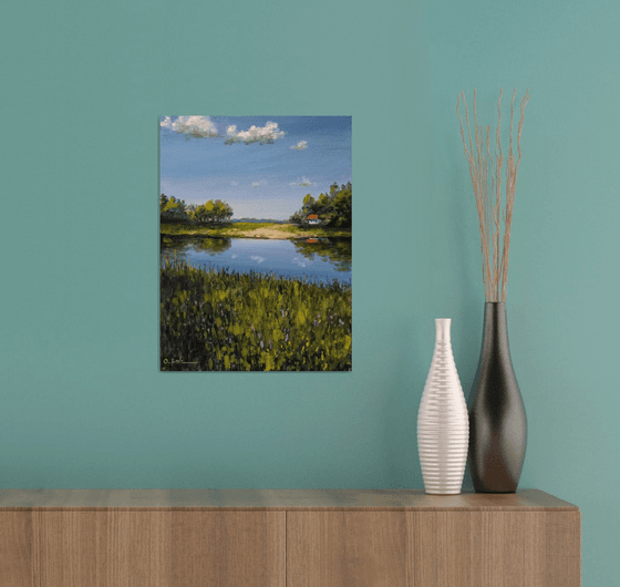 A farmstead by the river