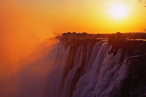 Sunset over the Victoria Falls by Alex Cassels