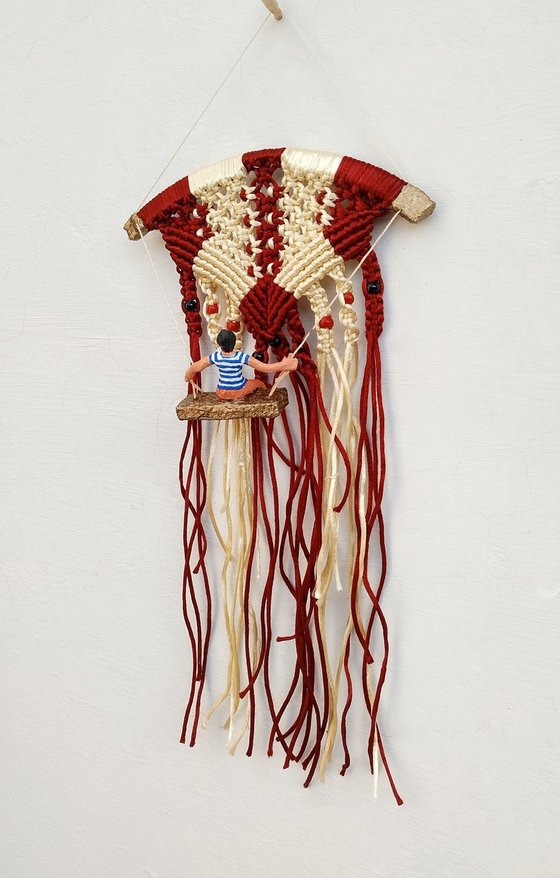 Boy and the macrame knots wall hanging