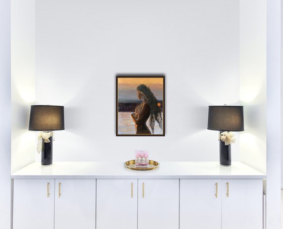 Naked woman by the river