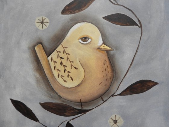 The bird between the leaves