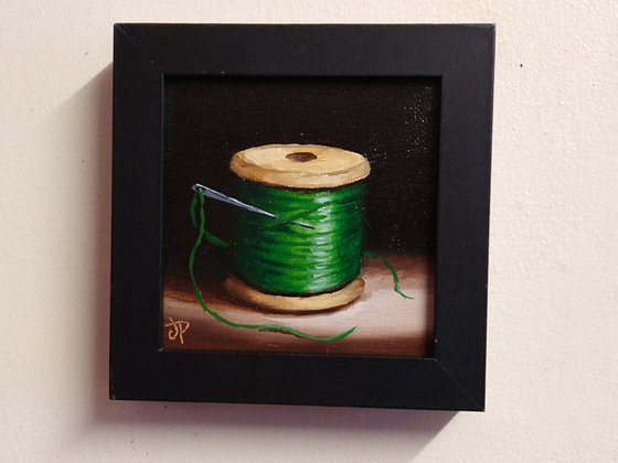 Little Green cotton reel  still life