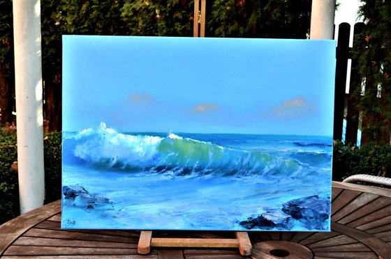 Seascape with transparent wave