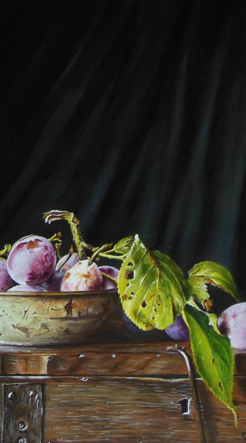 Plums in a rusty dish on a box (30x40cm) by Jan Teunissen