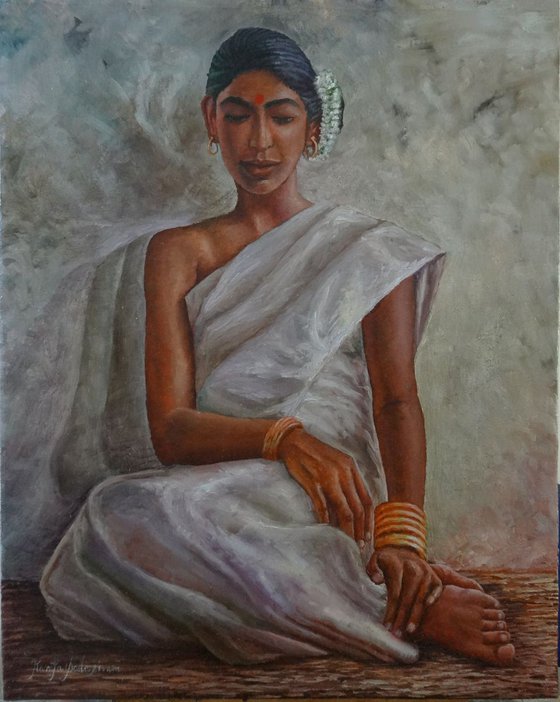 Woman in white saree