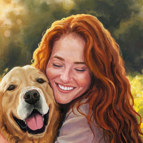 Smiling red-haired woman hugging a dog