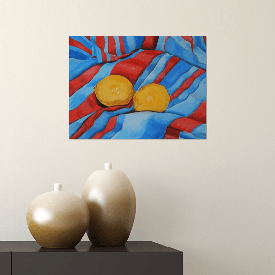 Lemons on the tablecloth. Still life. 30x40cm