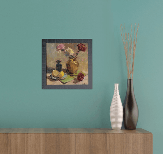 Copper vase and some lemons