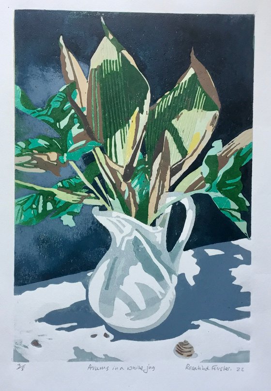 Arums in a white jug