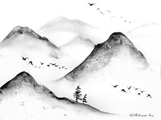 Mountains and flying birds