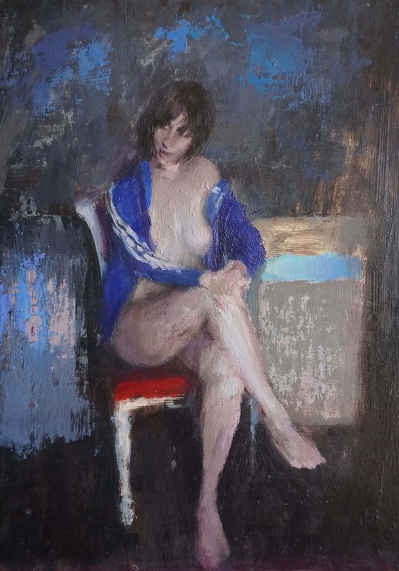 Lucile on red chair