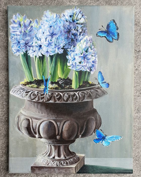 Floral acrylic blue hyacinths in vase